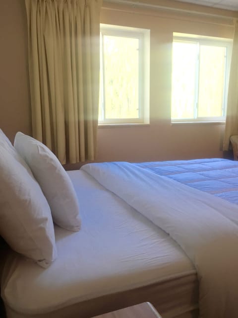 Premium bedding, down comforters, desk, iron/ironing board