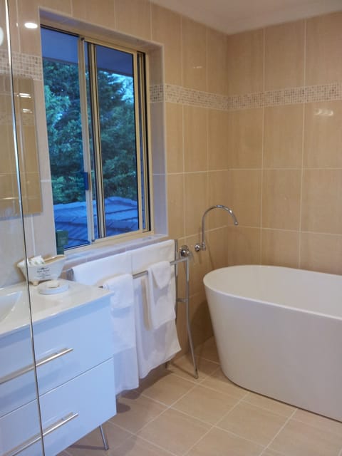 Baudin Room | Bathroom | Eco-friendly toiletries, hair dryer, slippers, heated floors