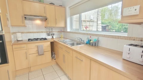 Fridge, electric kettle, toaster, cookware/dishes/utensils