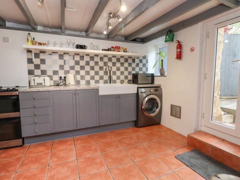 Fridge, electric kettle, toaster, cookware/dishes/utensils