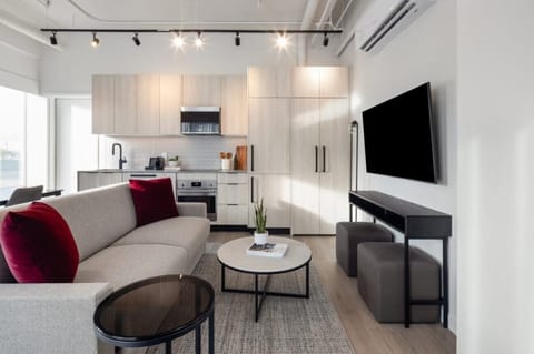 Waterfront One Bedroom Suite | Living area | 55-inch Smart TV with cable channels