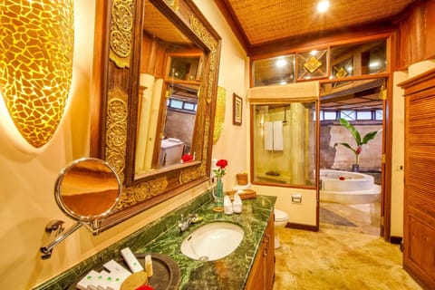Deluxe Spa Villa | Minibar, in-room safe, individually decorated, individually furnished