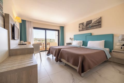 Comfort Quadruple Room, Balcony (Land view) | Minibar, in-room safe, desk, free WiFi