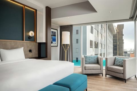 Panoramic Suite, 1 Bedroom, City View | Minibar, in-room safe, desk, soundproofing
