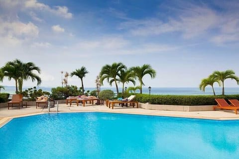 Outdoor pool, pool umbrellas, sun loungers