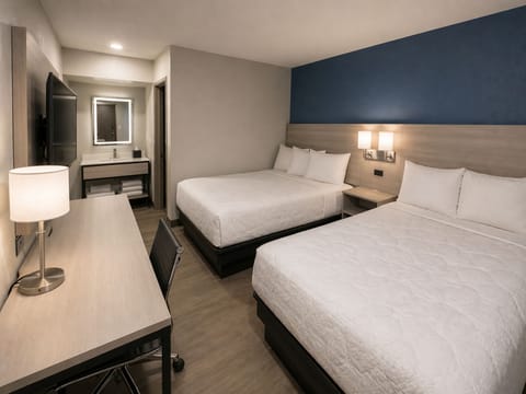 Standard Room, 2 Double Beds, Non Smoking | WiFi (free), bed sheets