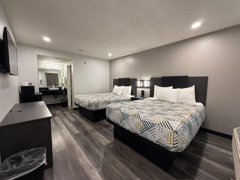 Desk, laptop workspace, free WiFi, bed sheets