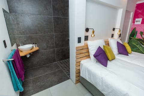 Standard Double Room 2 = Umlilo = double room with double bed | Individually decorated, individually furnished, blackout drapes