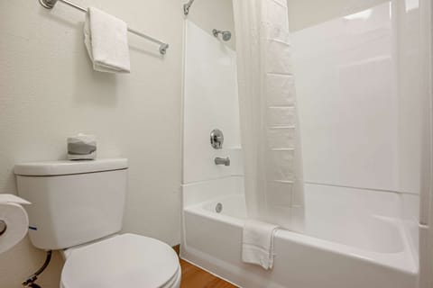 Combined shower/tub, towels, soap, toilet paper