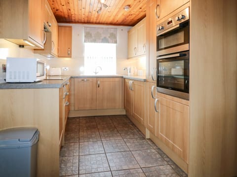 Fridge, electric kettle, toaster, cookware/dishes/utensils