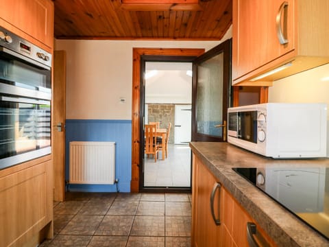 Fridge, electric kettle, toaster, cookware/dishes/utensils