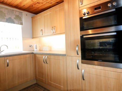 Fridge, electric kettle, toaster, cookware/dishes/utensils