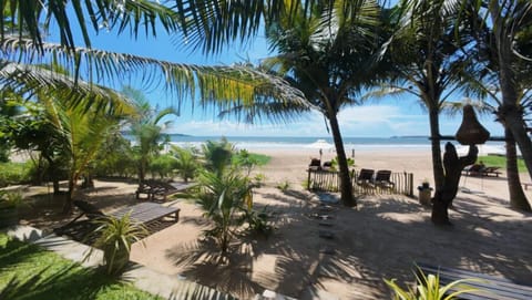 On the beach, free beach cabanas, beach umbrellas