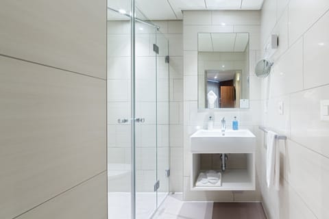 Premium bedding, down comforters, pillowtop beds, in-room safe