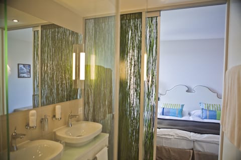 Shower, free toiletries, hair dryer, slippers