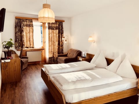 Double Room, Balcony | Living room | Flat-screen TV