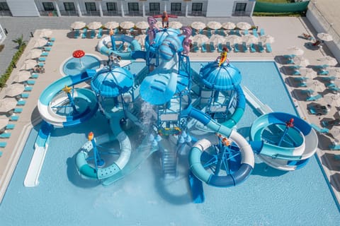 Indoor pool, seasonal outdoor pool, pool umbrellas, sun loungers