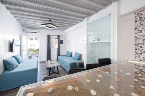 Comfort Apartment, Multiple Beds | Living area | 43-inch Smart TV with digital channels, Netflix, streaming services