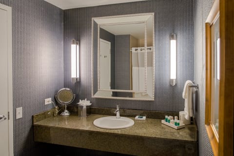 Combined shower/tub, designer toiletries, hair dryer, bathrobes