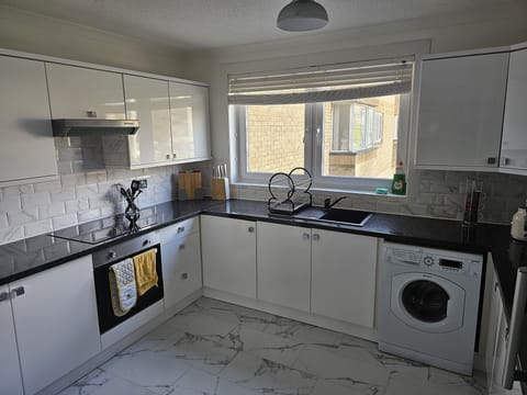 Apartment | Private kitchen | Full-size fridge, microwave, oven, stovetop