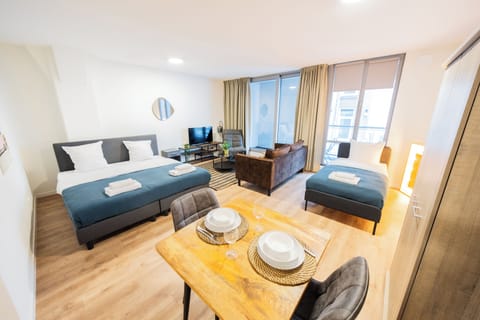 Basic Studio | Living area | 40-inch LCD TV with digital channels, heated floors, streaming services