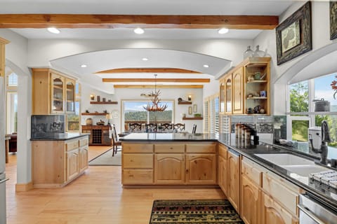 House (4 Bedrooms) | Private kitchen | Fridge, microwave, oven, stovetop