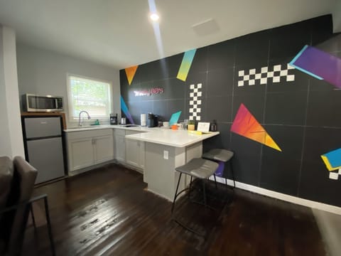 Mini-fridge, microwave, stovetop, coffee/tea maker