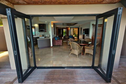 Luxury Villa, Private Pool, Beachfront | Living area | 50-inch flat-screen TV with cable channels