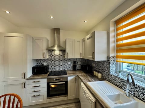 Family Townhome | Private kitchen | Electric kettle