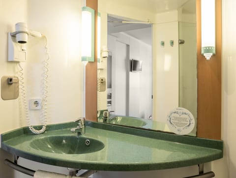 Shower, eco-friendly toiletries, hair dryer, towels