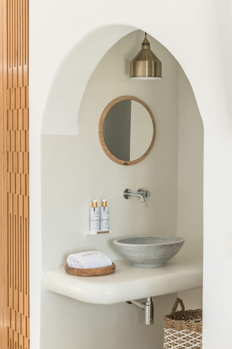 Shower, rainfall showerhead, designer toiletries, hair dryer