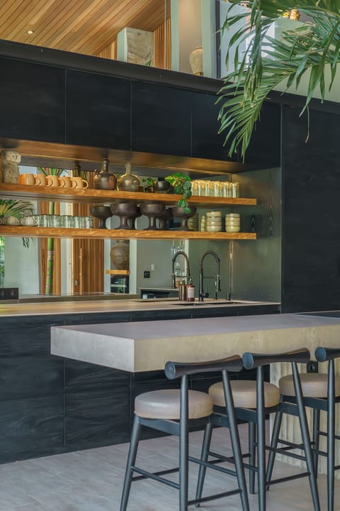 Full-size fridge, stovetop, rice cooker, cookware/dishes/utensils