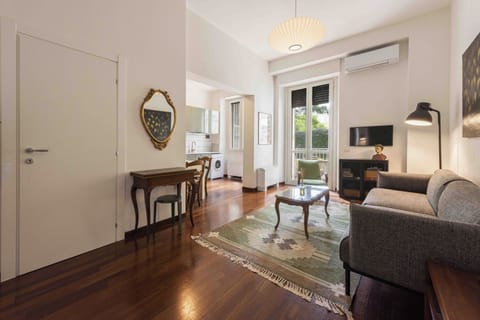 Comfort Apartment | Living area | 40-inch flat-screen TV with digital channels