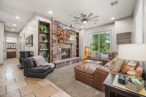 Condo, Multiple Beds, Balcony, Mountain View (Poolside Retreat) | Living area | 65-inch flat-screen TV with digital channels, TV, fireplace