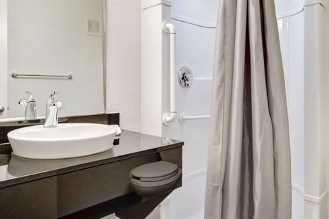 Shower, towels, toilet paper