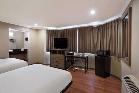 Desk, blackout drapes, free cribs/infant beds, free WiFi