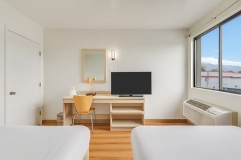 Individually furnished, desk, laptop workspace, blackout drapes