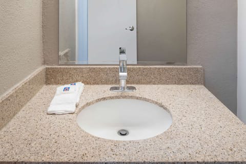 Combined shower/tub, hair dryer, towels, soap