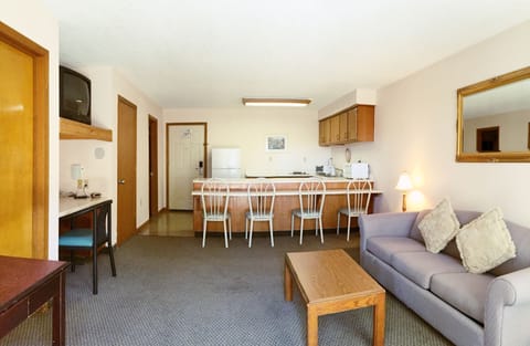 Suite, 1 King Bed, Non Smoking | Desk, laptop workspace, iron/ironing board, rollaway beds