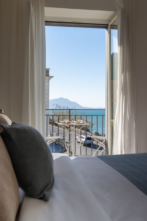 Luxury Double Room, Balcony, Sea View | Frette Italian sheets, premium bedding, individually decorated