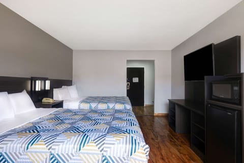 Laptop workspace, free WiFi, bed sheets