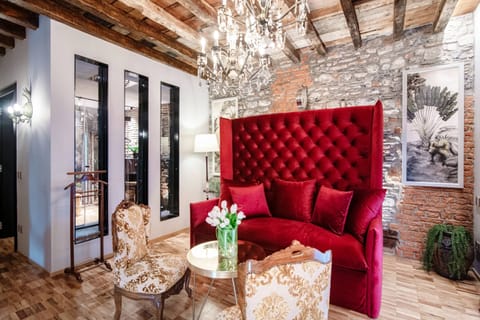 Deluxe Suite | Living area | 40-inch LED TV with satellite channels