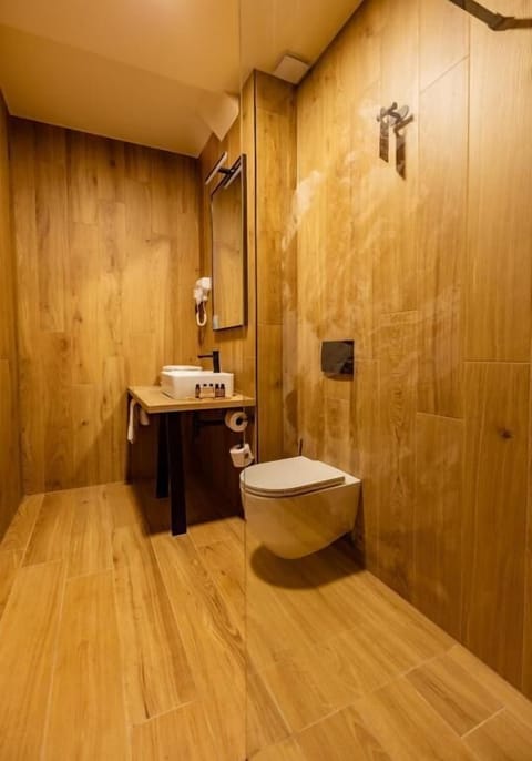 Deluxe Double Room, Mountain View | Bathroom | Hair dryer, slippers, towels, soap