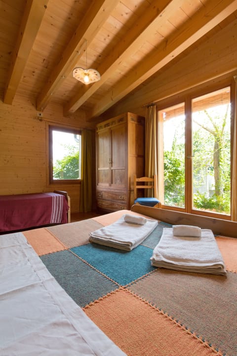 Deluxe Chalet, 2 Bedrooms, Accessible, Ground Floor | Desk, blackout drapes, soundproofing, free WiFi