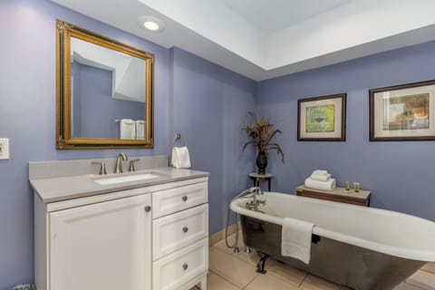 Signature Suite, 1 Bedroom, Balcony, City View | Bathroom | Combined shower/tub, hair dryer, towels, soap