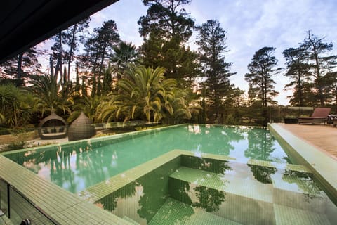 Outdoor pool, open 7:00 AM to 7:00 PM, sun loungers