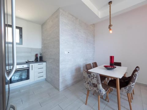 Premium Villa | Private kitchen | Dining tables