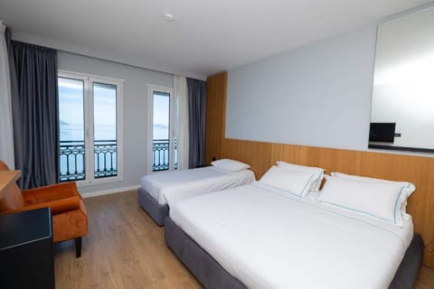 Triple Room, Balcony, Sea View | Free WiFi, bed sheets