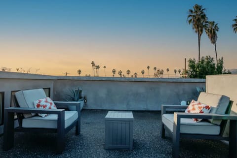 Sunset over the Palm Trees Apartment in West Hollywood