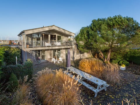 Sunshine Through Trees Apartment in Kamperland